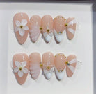Set of handmade nail art designs in a box labeled 'Handmade Nail by professional nail designer'.