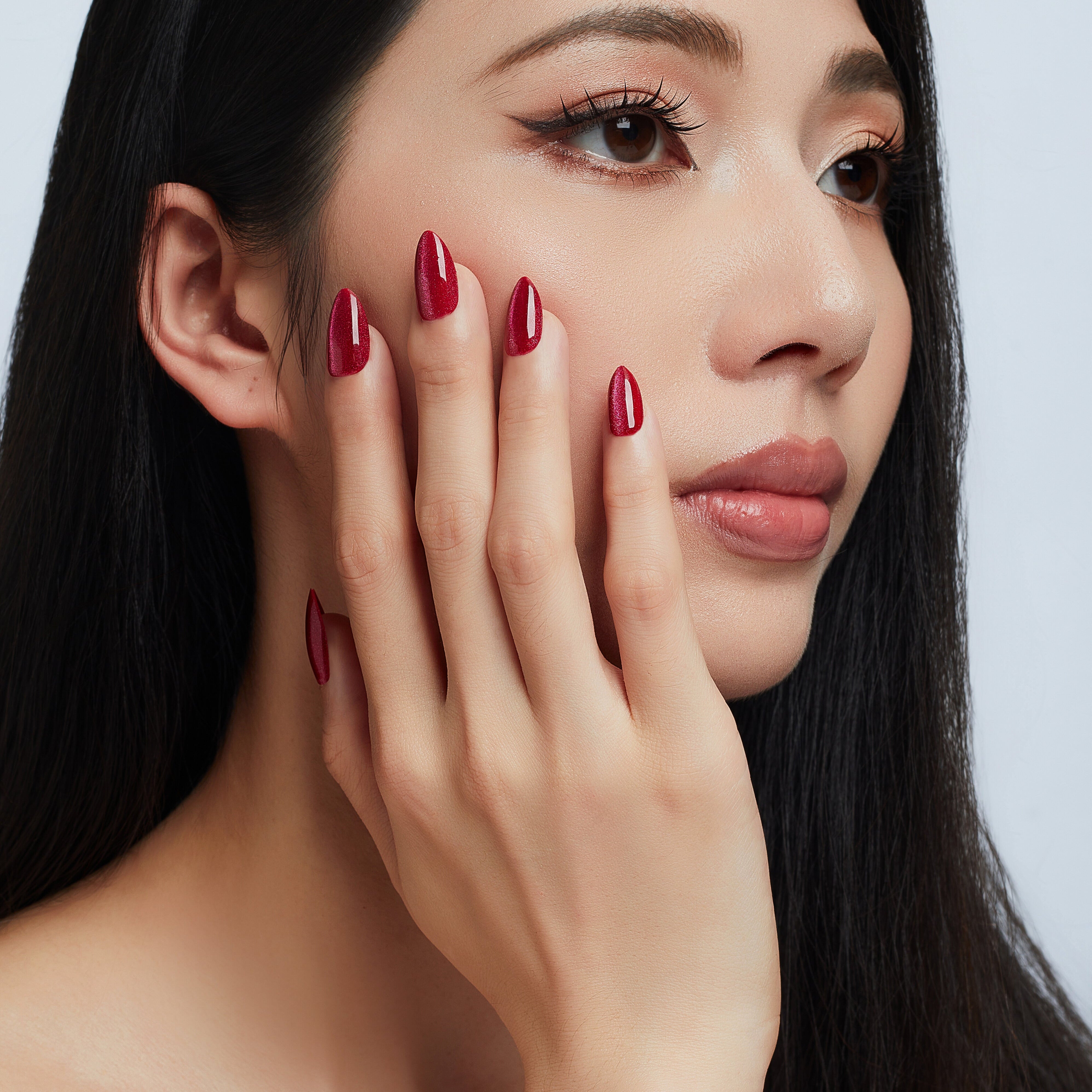 red nails, red cat eye, red almond nails, short red nails, press on nails, glued-on nails,